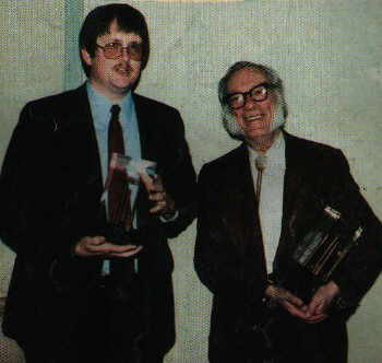 Here we see a younger, geekier, and slightly more overweight Orson Scott Card, standing next to Sir Isaac Asimov, both of whom are holding their Nebula awards--Mr. Card clearly does not need me to tell him how awesome he is