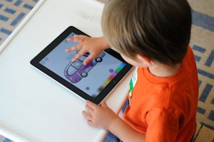 child with iPad